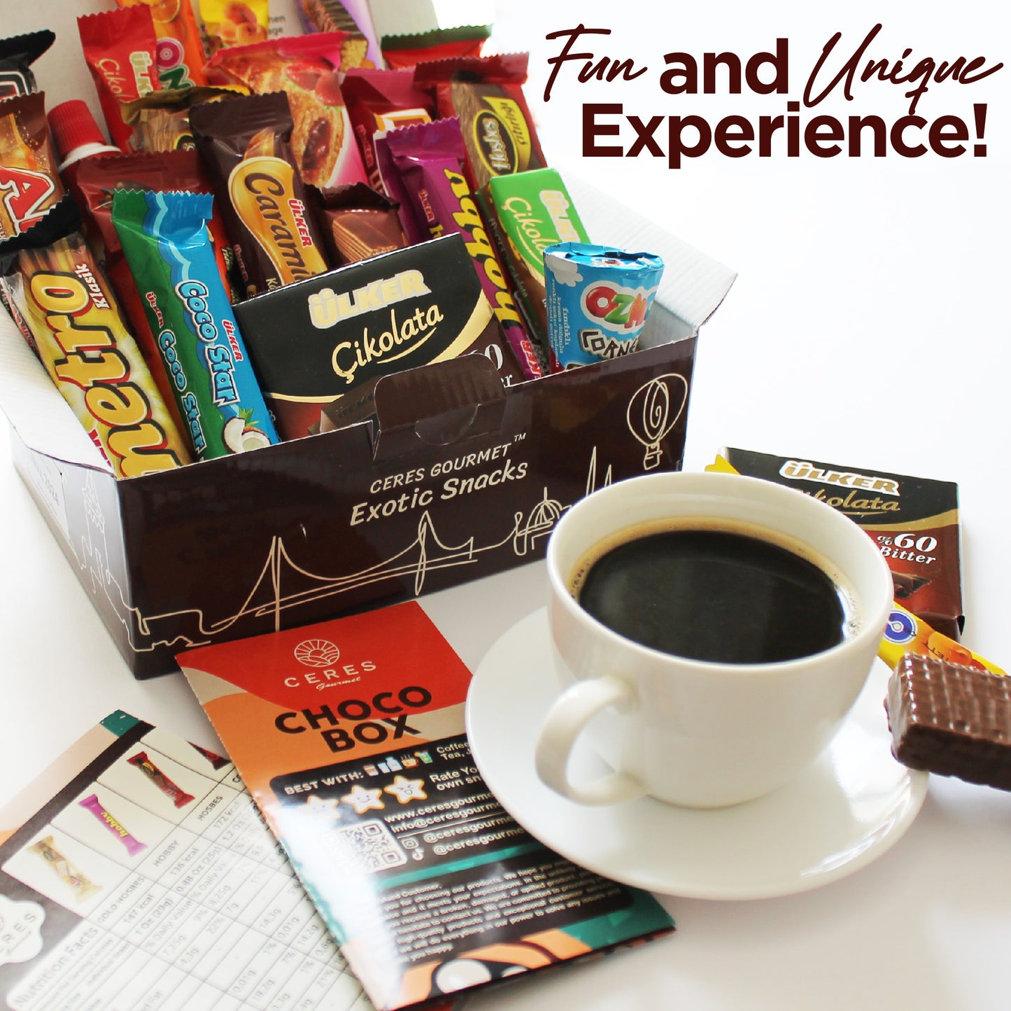 The Ceres Gourmet International Chocolate Variety Box (21 pieces) sits beside a cup of black coffee, pamphlets, and a partially unwrapped chocolate bar. Text above reads: Fun and Unique Experience!.