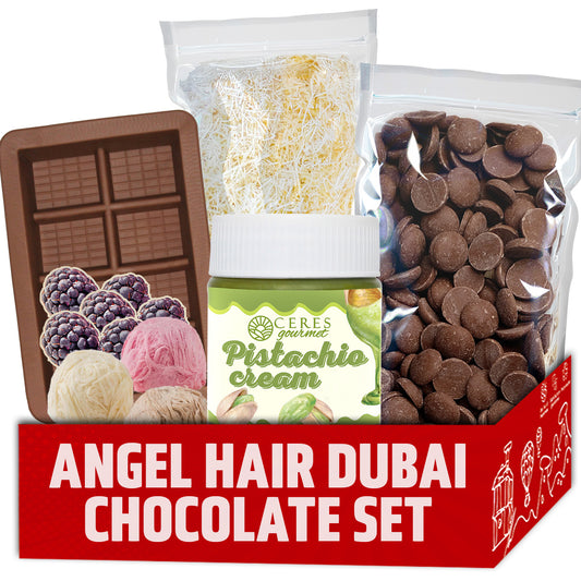 Chocolate set with a mold, cream, and chocolate chips on a white background