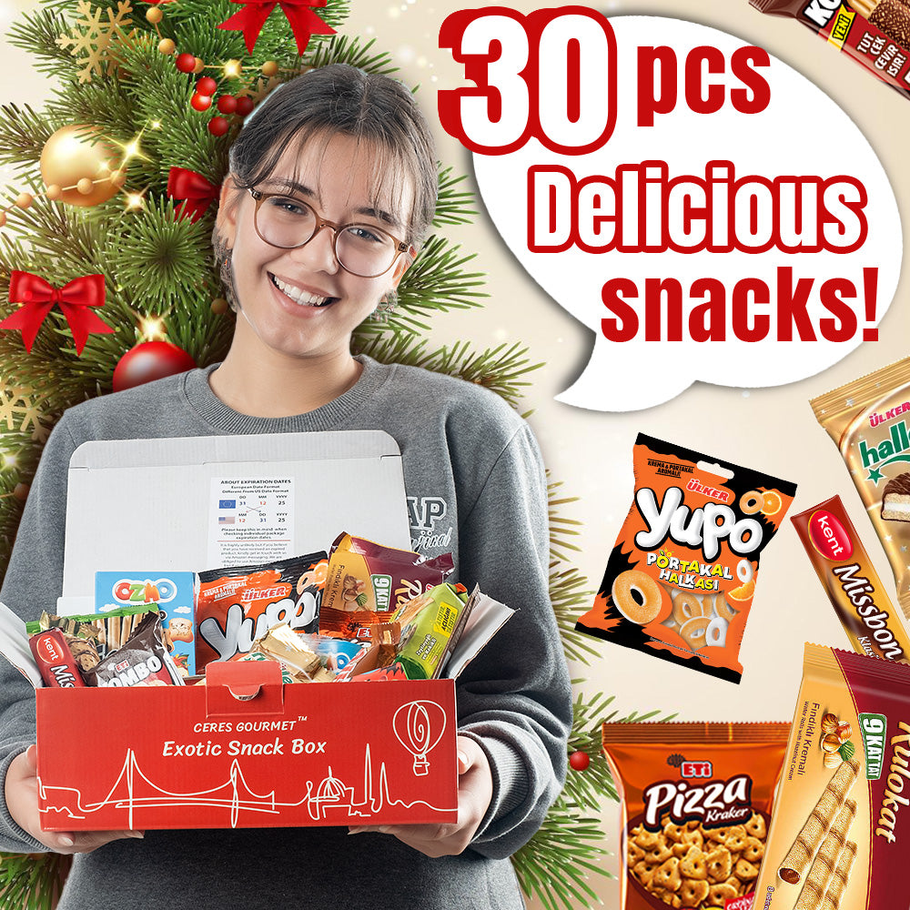 A smiling person holds the Ceres Gourmet International Snack Box (30 Unique Pcs), filled with global treats. A decorated Christmas tree is in the background, and images of snack packs surround bold text: â30 Unique Snacks!â.