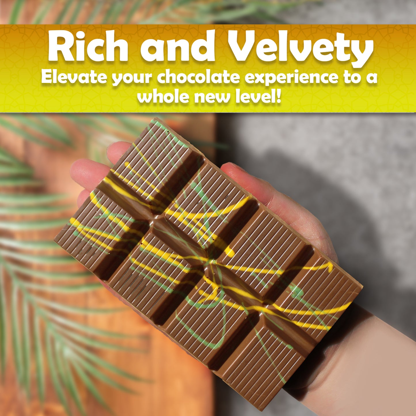 A hand holds a Ceres Gourmet Dubai Chocolate Kunafa Pistachio Bar (Dark, White, Milky - 7 oz) under a Rich and Velvety yellow banner. Elevate your chocolate experience with this delight; a palm leaf’s shadow lies nearby.