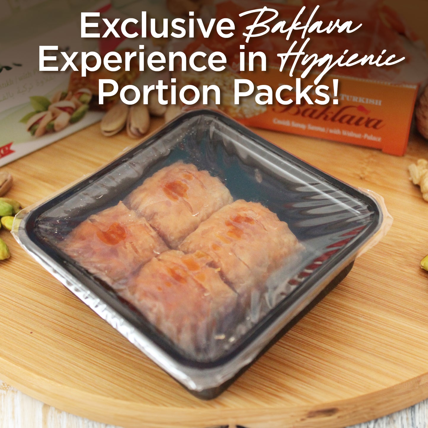 A plastic tray with four Ceres Gourmet Assorted Turkish Baklava—Pistachio & Walnut 4 Pack—rests on a wooden board with pistachios. Text above: Exclusive, Hygienic Portion Packs—perfect for any baklava gift box!.