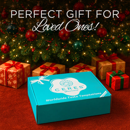 Ceres Gourmet gift box in front of a decorated Christmas tree with presents.