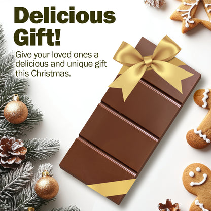 A Ceres Gourmet Dubai Chocolate Bar Pistachio with Milky Chocolate and Knafeh sits among gingerbread cookies and frosted pine. Text reads: Delight your loved ones with a unique gift from Ceres Gourmet this Christmas!.