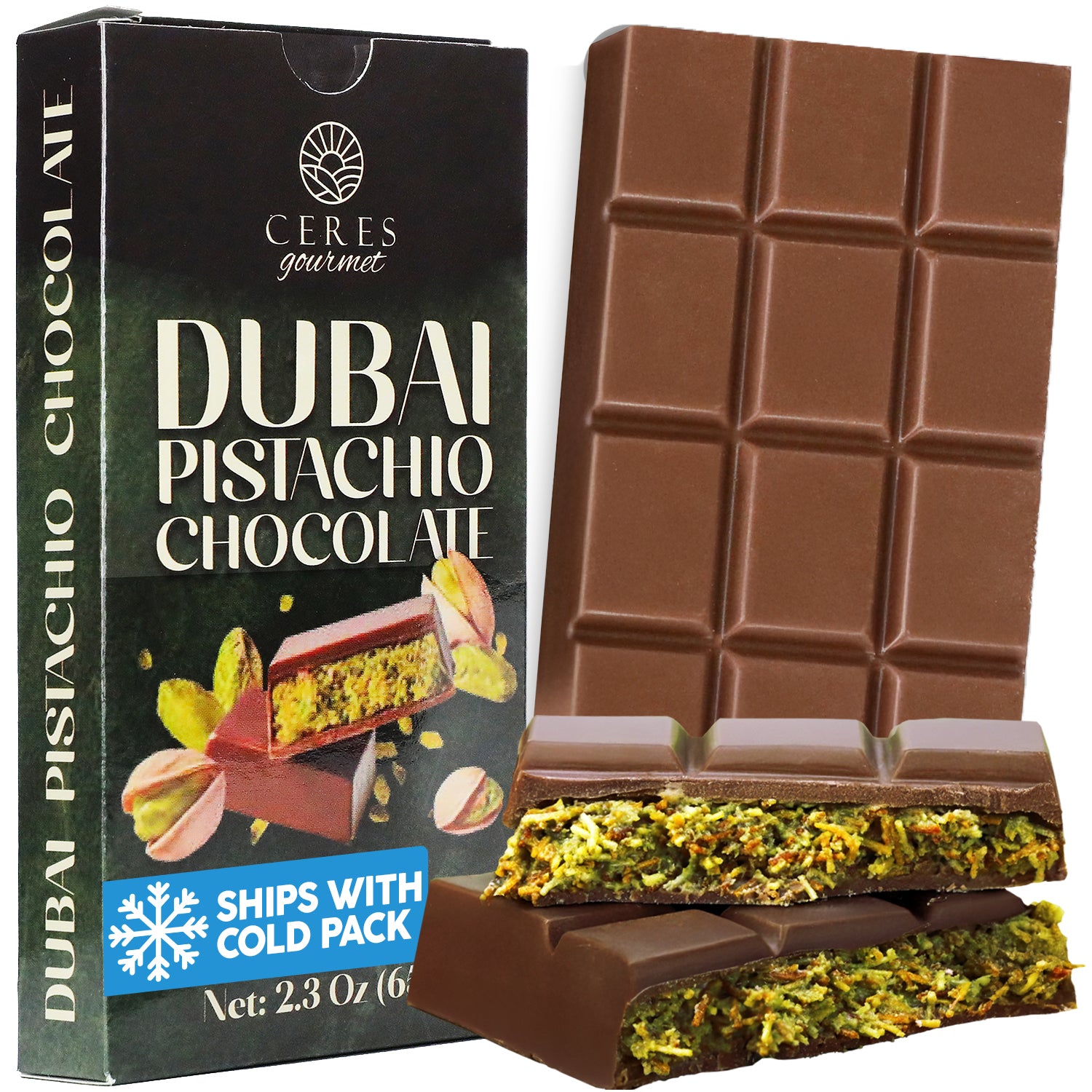 A Ceres Gourmet Dubai Chocolate Bar 2.3 oz sits next to its box, with two pieces revealing green pistachio filling. The box shows chocolate and pistachios and states: Ships with cold pack. Available in 3, 12, or 24 packs.