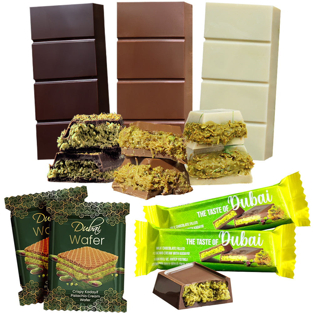 Ceres Gourmet’s Dubai Chocolate Variety Pack features 7 assorted milk, dark, and white chocolate bars and wafers filled with pistachio, some broken to show the green filling. Packaged in a gift box.