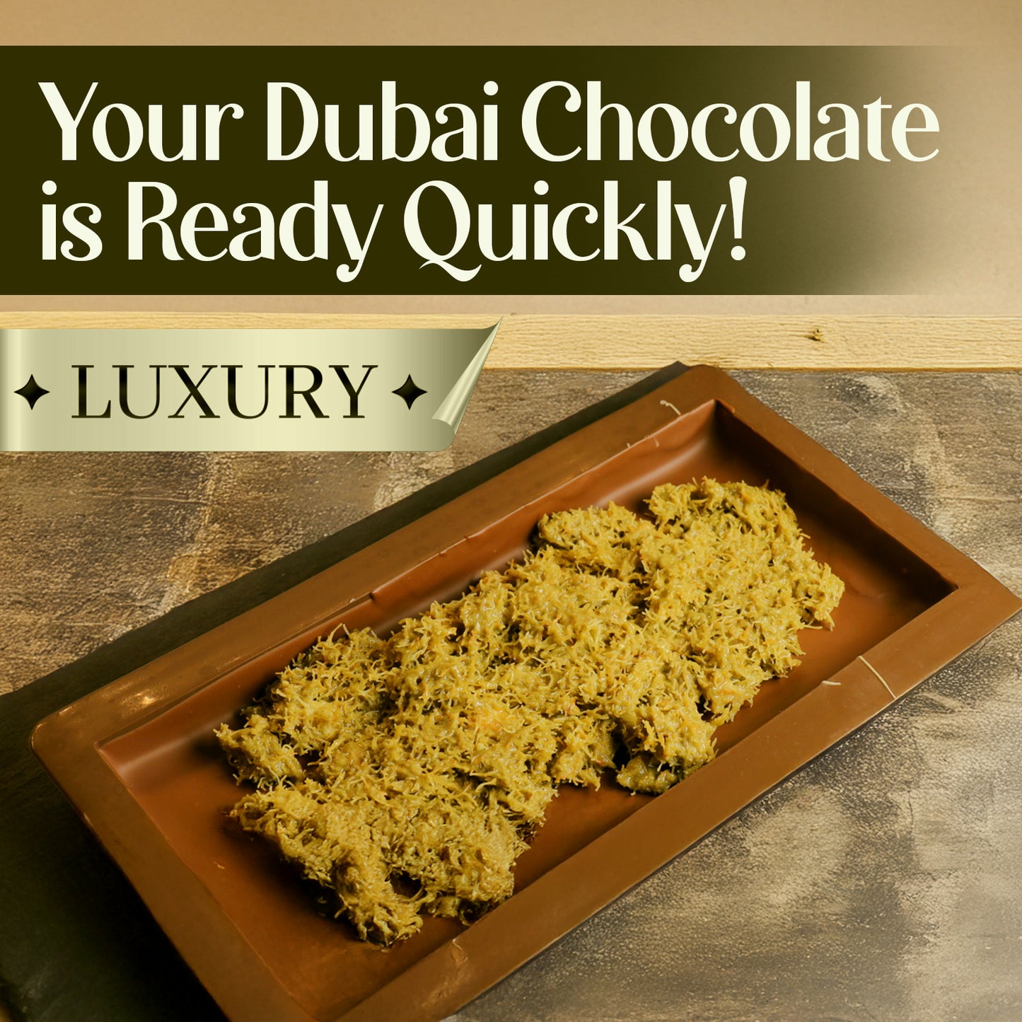 A rectangular brown tray displays a heap of Ceres Gourmet Pistachio Filling for Dubai Chocolate – 2.2 lb, with text above: Your Dubai Chocolate is Ready Quickly! LUXURY on a gold banner, set against neutral brown tones.