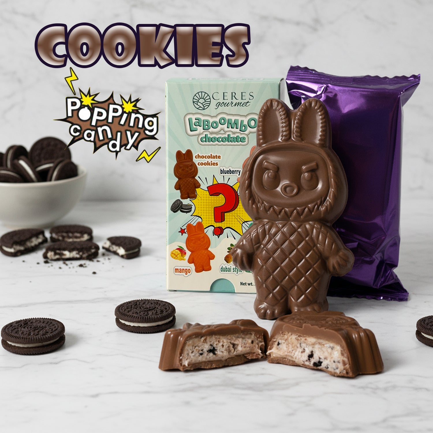 Chocolate cookies with a packaging box and a purple bag on a white surface.