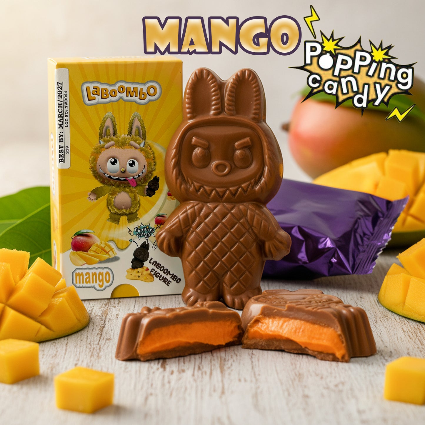 Chocolate candy with a cartoon character packaging, surrounded by mango pieces on a wooden surface.