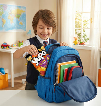 Child opening a blue backpack filled with school supplies in a classroom setting.