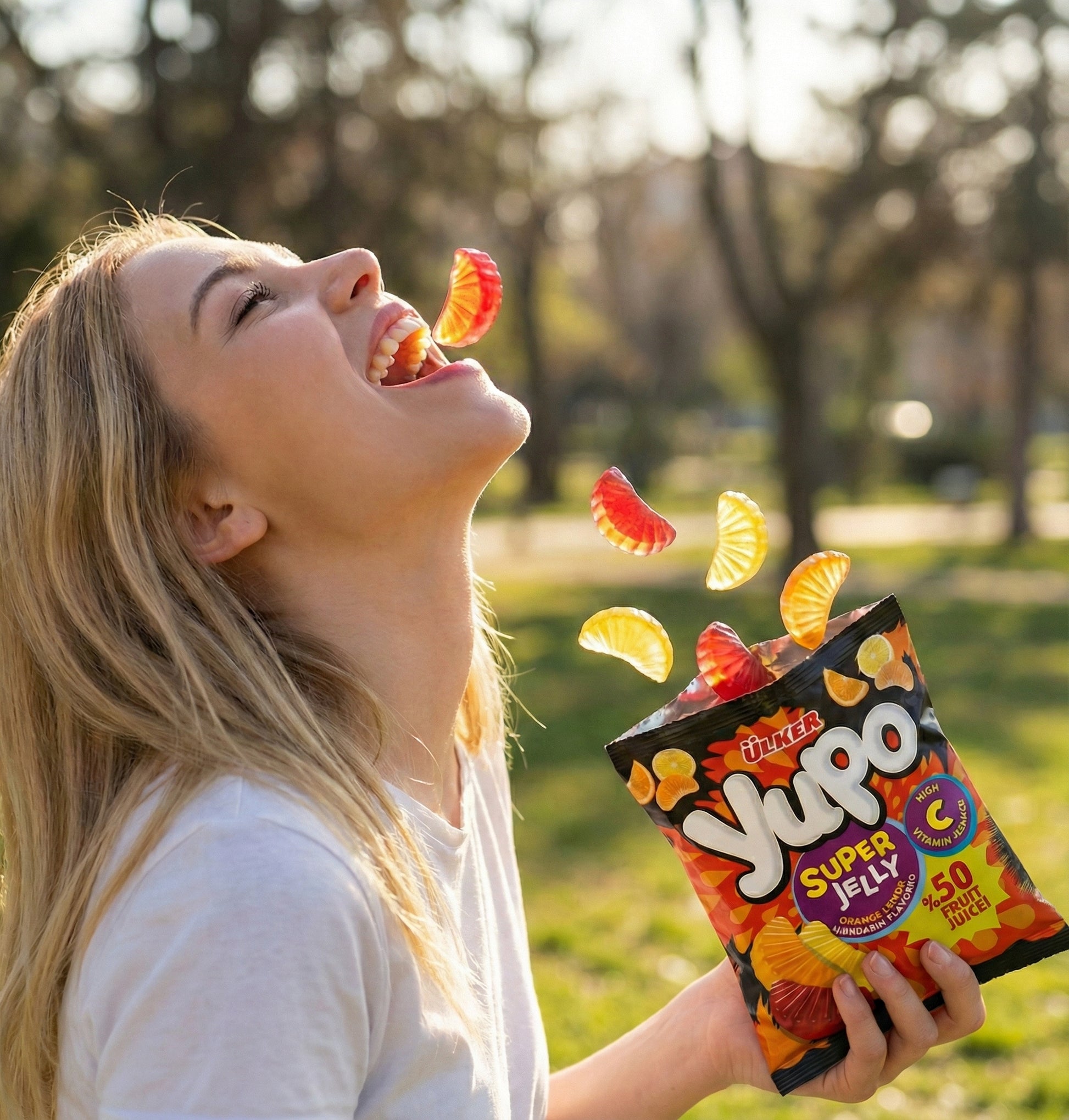 Woman enjoying Yupo jelly candy outdoors