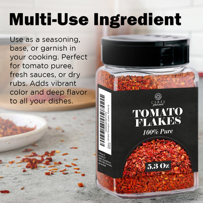 A clear jar labeled Ceres Gourmet Dried Tomato Powder – 5.3 oz, 100% Pure sits on the counter, perfect for adding rich tomato flavor to sauces, soups, and pastes or using as a versatile seasoning in your kitchen.