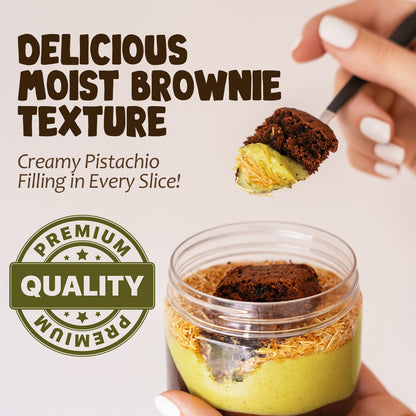 Dessert in a jar with brownie and pistachio filling, labeled 'Delicious Moist Brownie Texture' and 'Premium Quality'.
