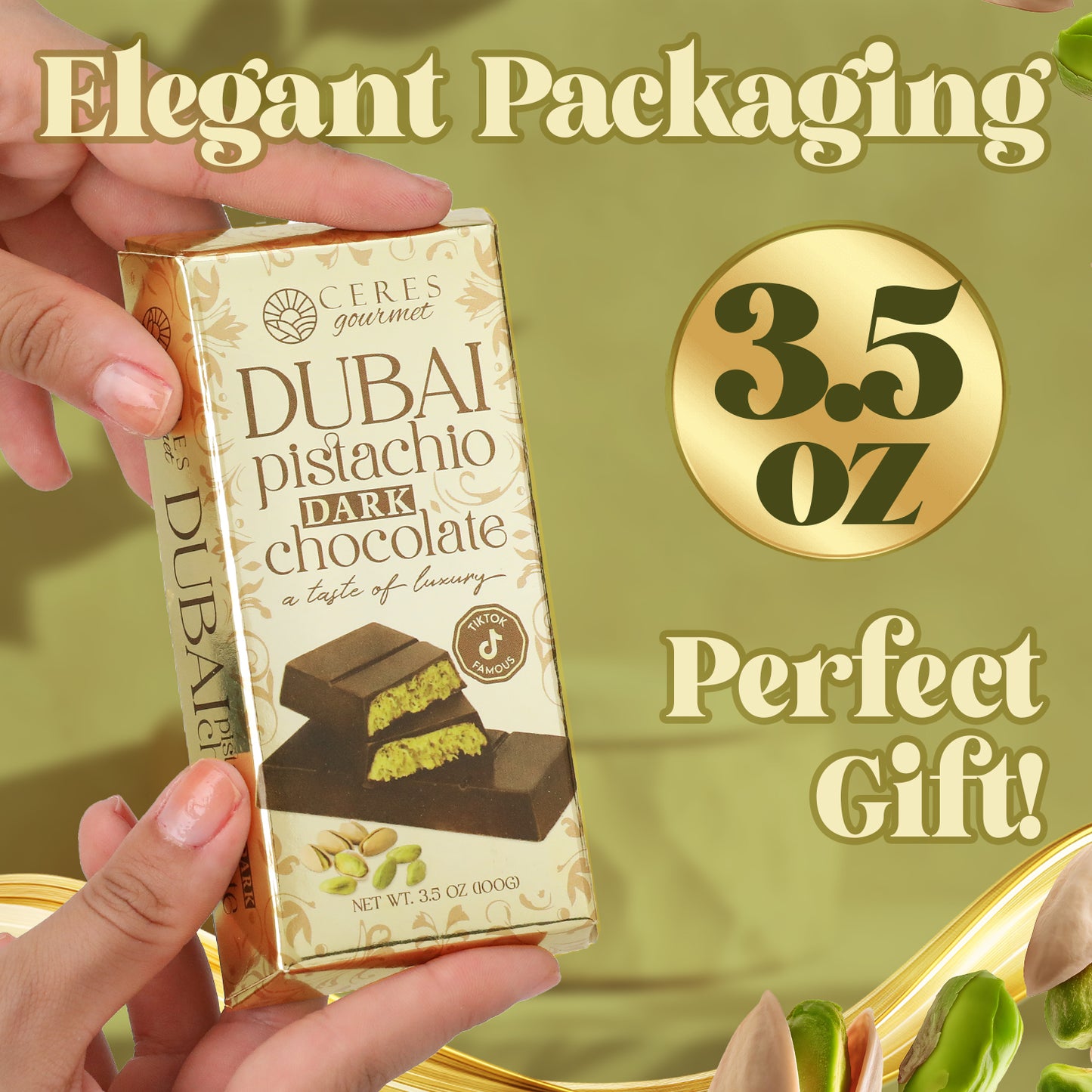 A hand holds a Ceres Gourmet Dubai Chocolate Bar Pistachio with Dark Chocolate & Knafeh (3.5 oz), featuring elegant packaging—Perfect Gift!—ideal for pistachio and chocolate lovers seeking a touch of luxury.