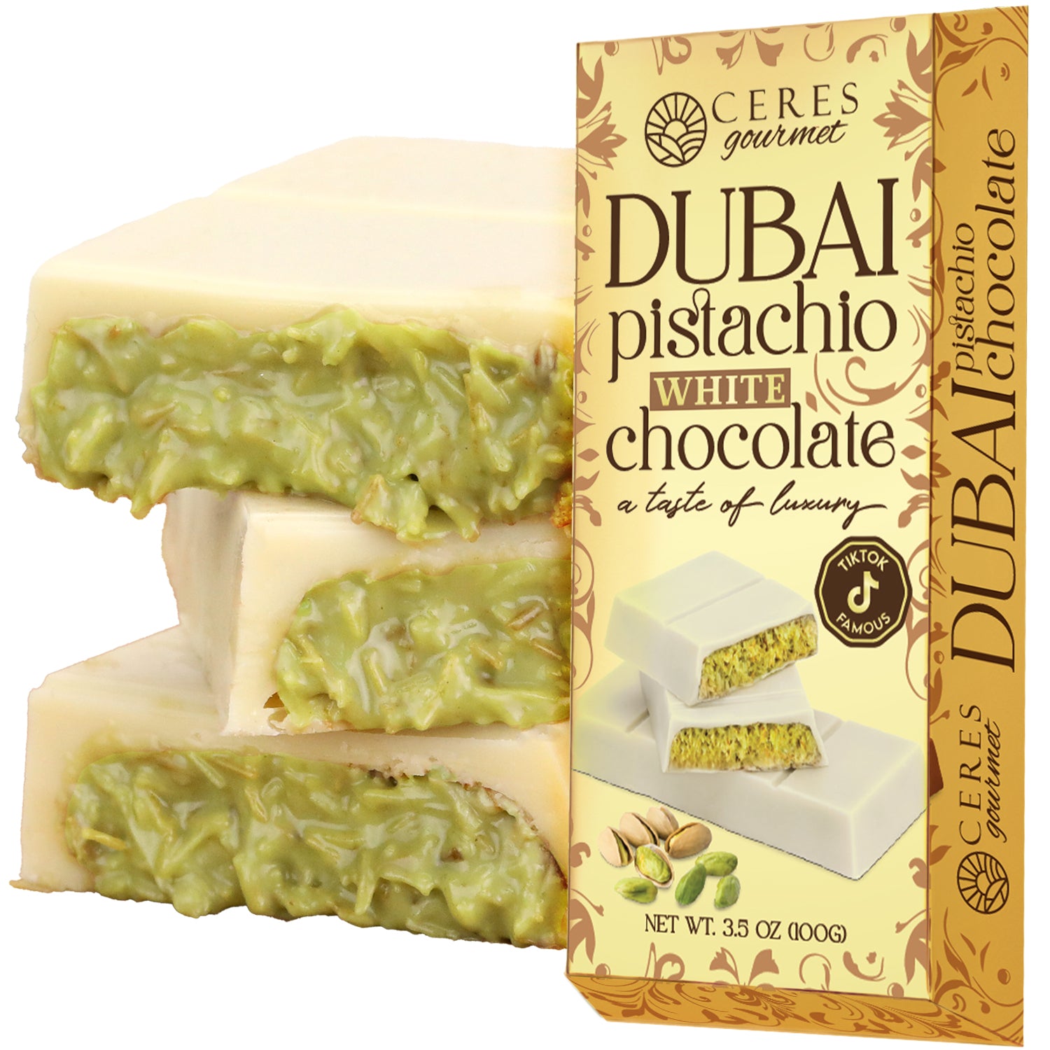 A stack of Ceres Gourmet Dubai Chocolate Bar Pistachio with White Chocolate & Knafeh (3.5 oz) sits beside its box, which showcases images and descriptions of chocolate, pistachios, and kunafa on the packaging.