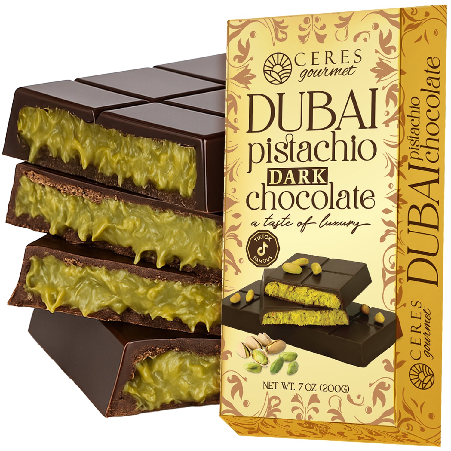 A box of Ceres Gourmet Dark Chocolate Dubai Crispy Knafeh Pistachio Bar 7oz is displayed beside pieces filled with creamy pistachio. The packaging highlights luscious dark chocolate and knafeh pistachios.