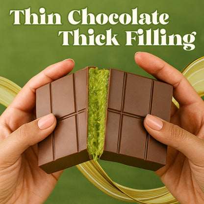 Two hands break apart a Ceres Gourmet Dubai Chocolate Kunafa Pistachio Indulge Bar, revealing rich pistachio cream inside. The green background features bold text: "Thin Chocolate Thick Filling—a tribute to Middle Eastern desserts.