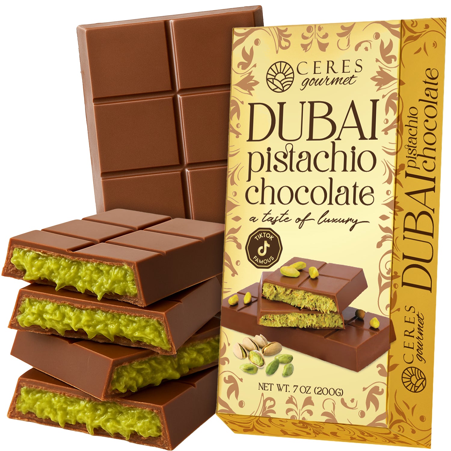 A Ceres Gourmet Dubai Chocolate Kunafa Pistachio Indulge in the Irresistible Delight 7oz Bar is displayed with its elegant gold packaging, showing broken pieces that reveal a pistachio cream filling inspired by Middle Eastern desserts.
