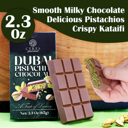 A Ceres Gourmet Dubai Chocolate Bar (2.3 oz) is shown with its package, labeled “Dubai Pistachio Chocolate.” A hand reveals its layered pistachio, kataifi, and smooth chocolate interior—a true Knafeh Bar from the 3-12-24-Pack collection.