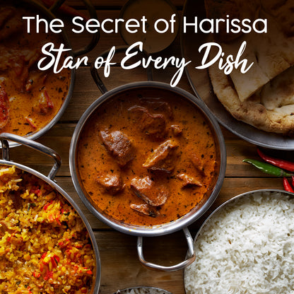A top view of curry, rice, naan, and spiced rice with the text: Ceres Gourmet Harissa Seasoning Blend, 3.5 oz—Aromatic & mildly spicy harissa powder—the star of every dish.
