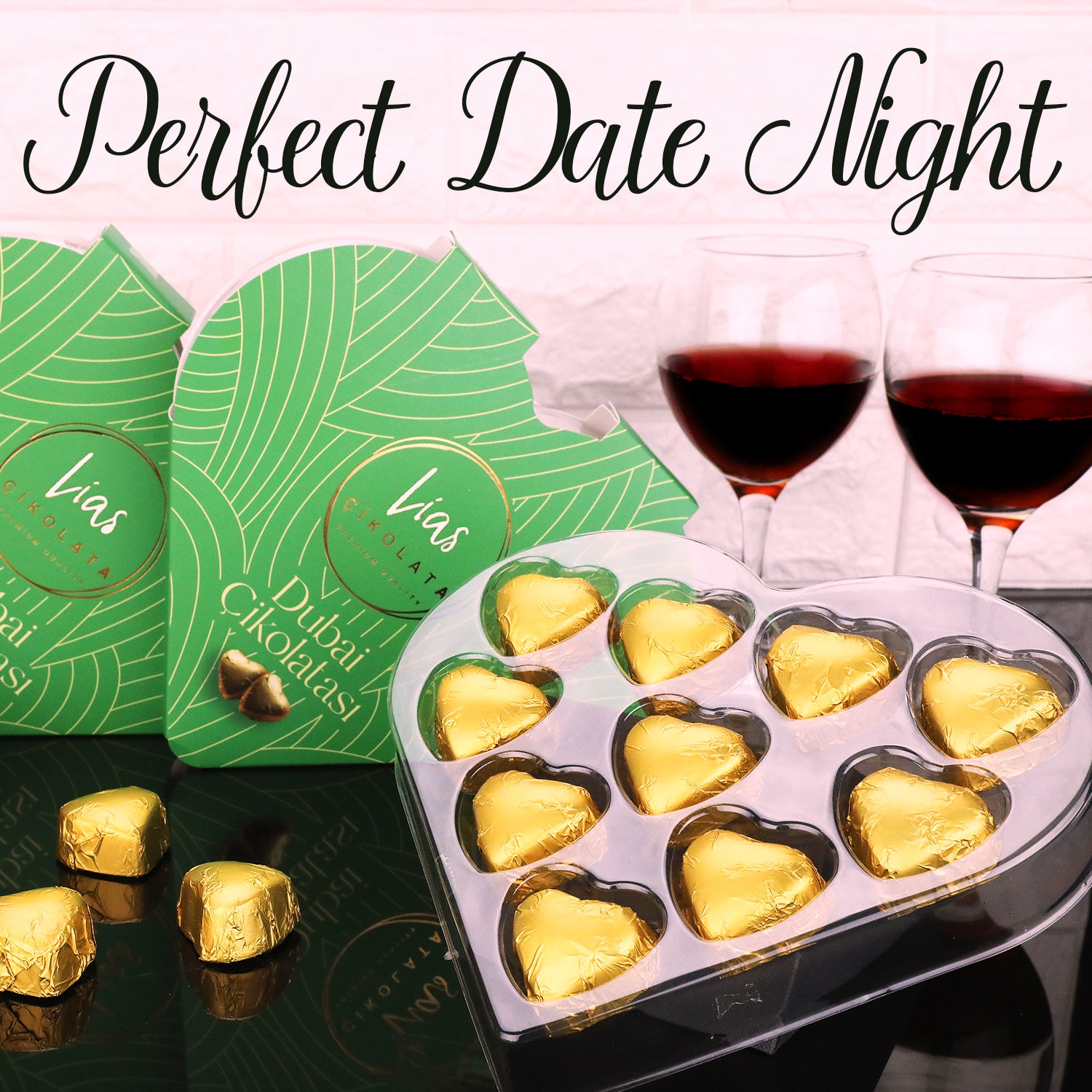 Two glasses of red wine, heart-shaped chocolates in gold wrappers, and green Ceres Gourmet gift boxes with Love Bite Dubai Chocolate Pistachio (10 bite-size pieces) on the table. Perfect Date Night is written at the top.