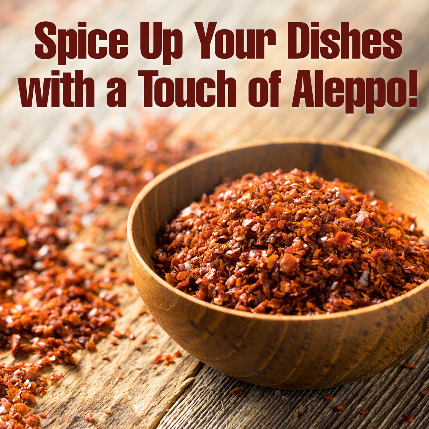 A wooden bowl with vibrant red Ceres Gourmet Premium Aleppo Pepper 7 Oz, freshly ground for exquisite flavor and mild heat, sits on a rustic table. Text above reads: Spice Up Your Dishes with a Touch of Aleppo!.