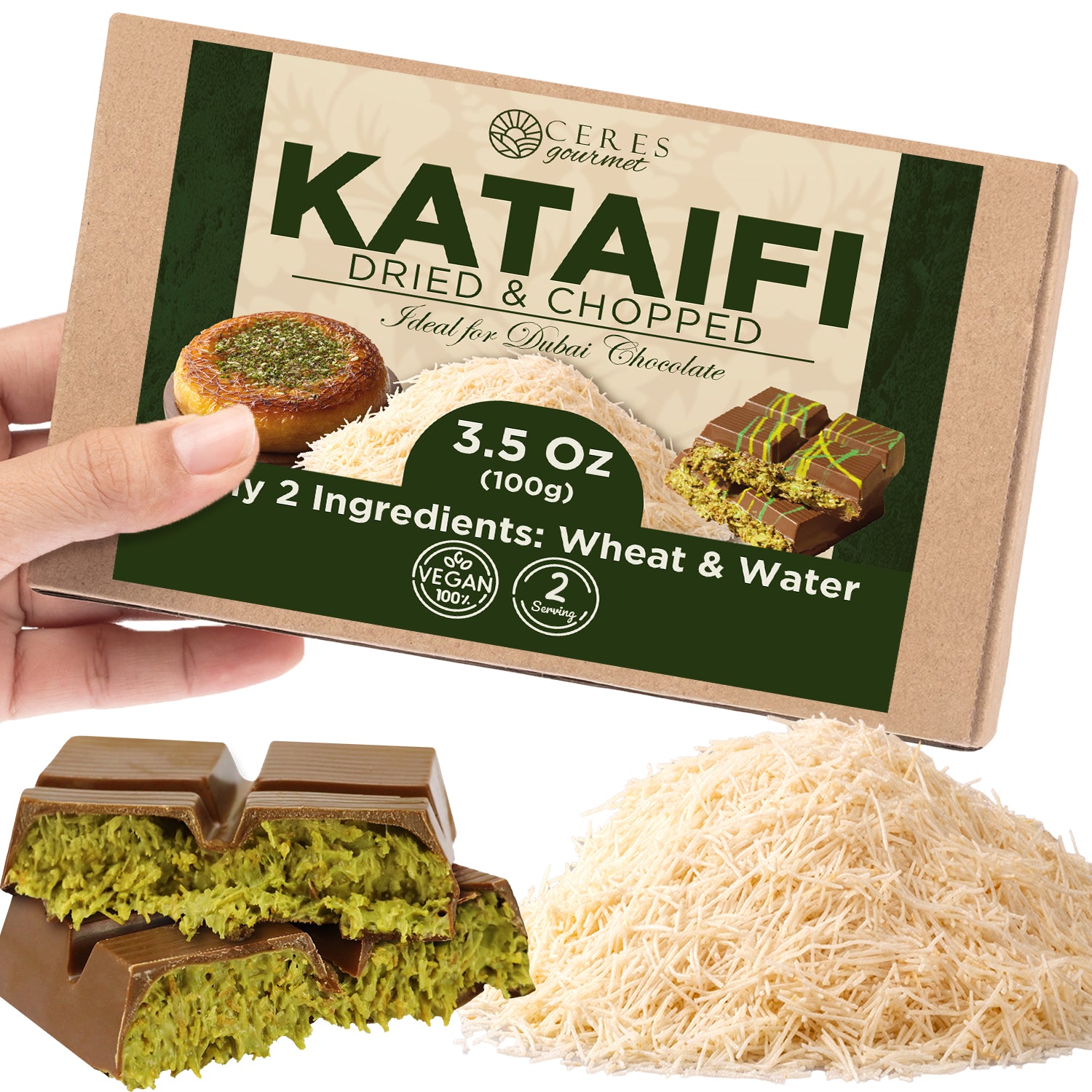 A hand holds a Ceres Gourmet Premium Kataifi Shredded Fillo Dough – 3.5oz (100g) box. In front are chocolate pieces with green filling and a pile of thin kataifi dough that’s vegan, made from only wheat and water.