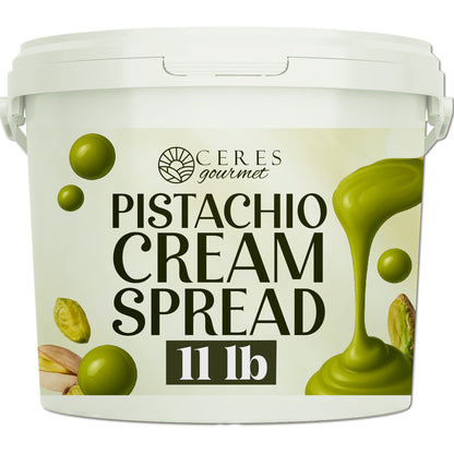 A white plastic tub labeled Ceres Gourmet Professional Pistachio Cream for Dubai Chocolate Bars, Pastry, and Desserts (11 lb), filled with green pistachio cream and Antep pistachio pieces—ideal for luxurious dessert applications.