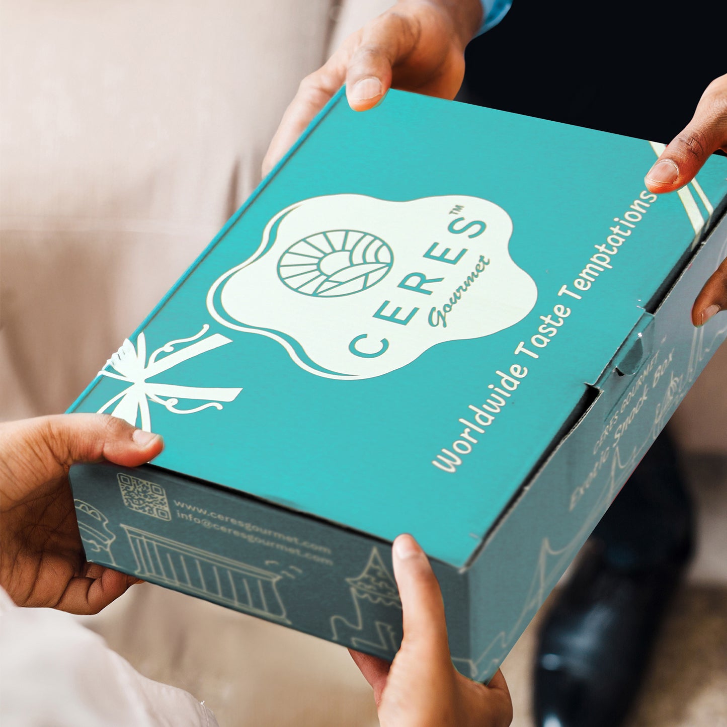 Ceres Gourmet box held by hands with a blurred background