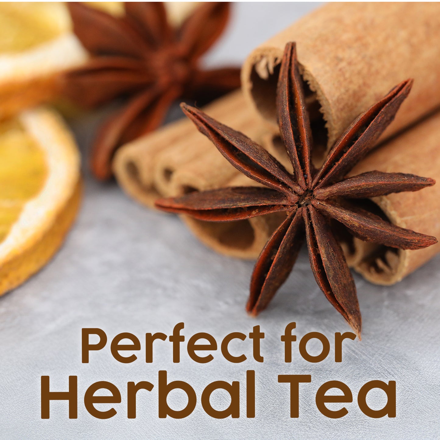 Close-up of Ceres Gourmet Whole Star Anise Pods (2.1 oz) on a gray surface with cinnamon sticks and dried orange—perfect for baking, cooking, or making anise tea; store fresh in a resealable jar.