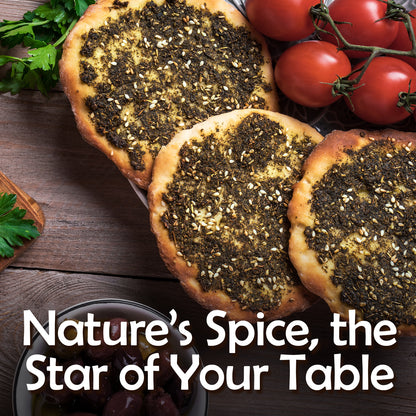 Three round flatbreads topped with Ceres Gourmet Zaatar Seasoning 7 oz, a Mediterranean spice blend, sit on a wooden table beside fresh tomatoes, herbs, and olives. Text: Nature’s Spice, the Star of Your Table.