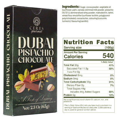 A Ceres Gourmet Dubai Chocolate Bar 3-12-24-Pack (2.3 oz/65g each) is displayed with ingredients, nutrition facts, and a photo of the pistachio-studded bar. The box reads A Taste of Luxury.